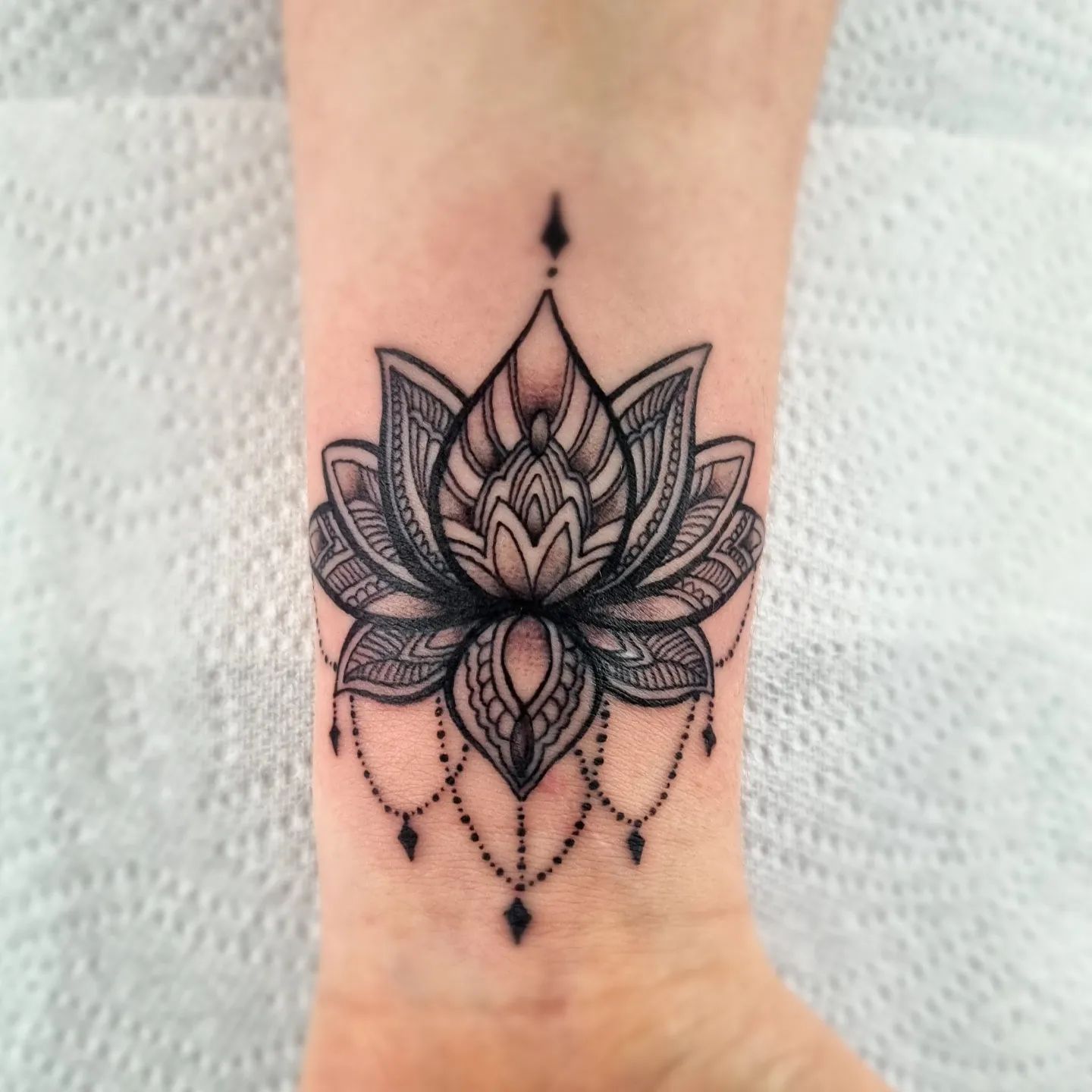 Lotus Symbolism Tattoo
